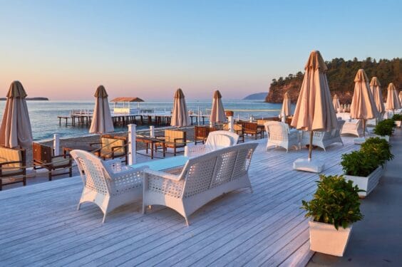 Scenic View Sandy Beach Beach With Sun Beds Umbrellas Open Against Sea Mountains Hotel Resort Tekirova Kemer Turkey Scenic View Sandy Beach Beach With Sun Beds Umbrellas Open Against Sea Mountains Hotel Resort Tekirova Kemer Turkey